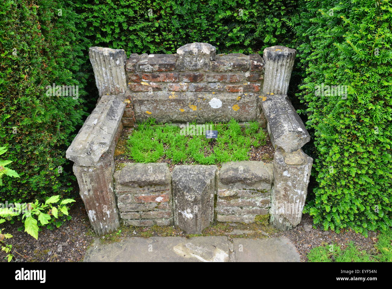 A Stone bench in Sissinghurst in Kent Stock Photo