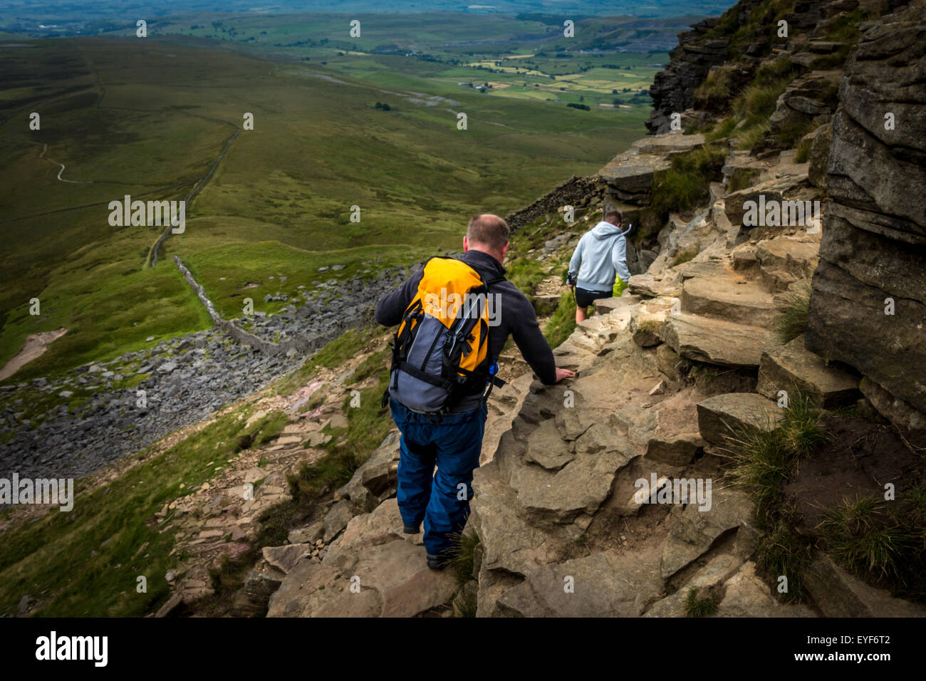 Descending off the narrow edge of Pen-y-ghent in the Yorkshire Dales Stock Photo