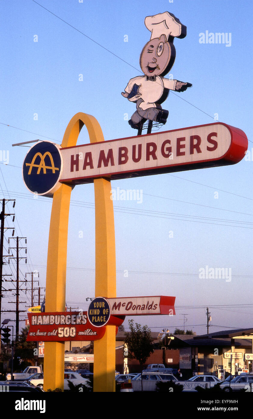 Neon sign for the oldest remaining original McDonald's which opened in 1953 featuring the Speedee mascot  in Downey, CA,, USA Stock Photo