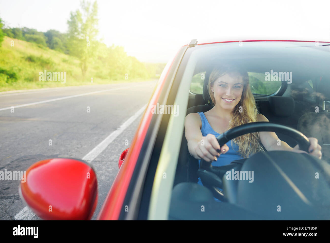 Woman in new car. Stock Photo