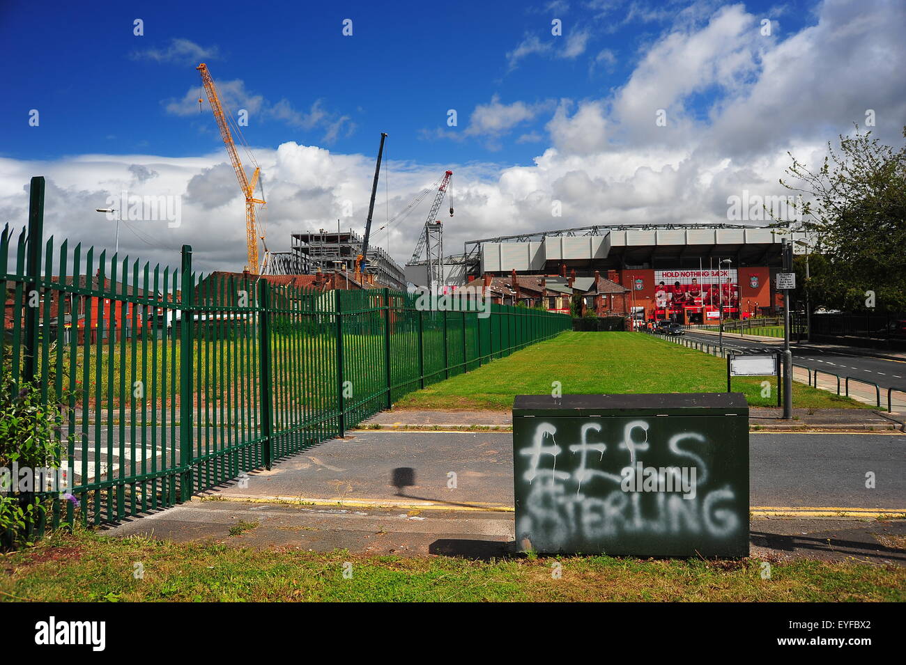 Graffiti on junction box criticising former Liverpool player Raheem Stirling. Stock Photo