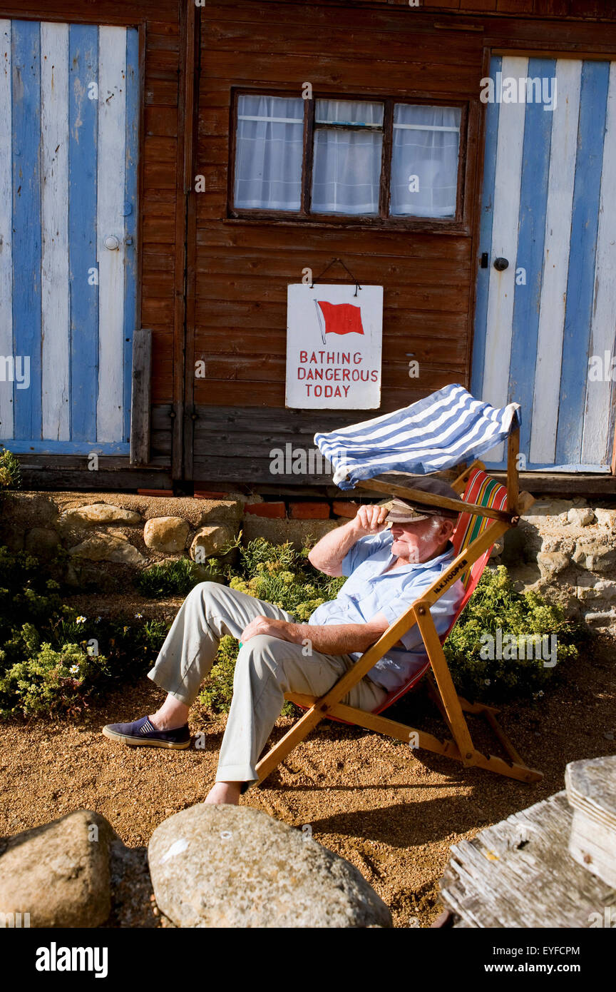 Uk, England, Isle Of Wight, Man Relaxing At Steephill Cove; Ventnor Stock Photo