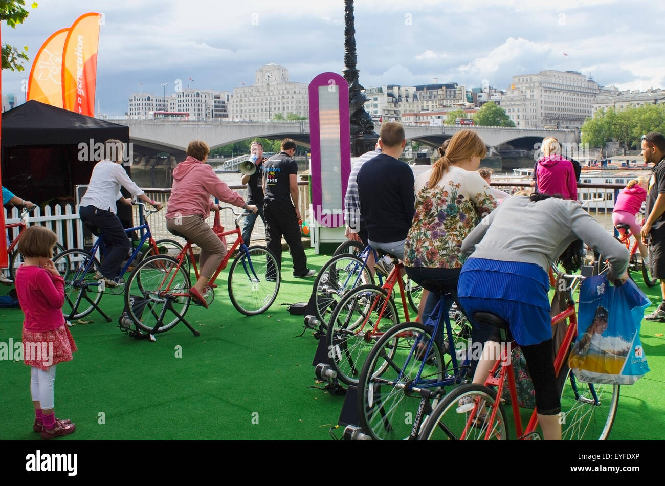 United Kingdom, England, People generating electricity by cycling