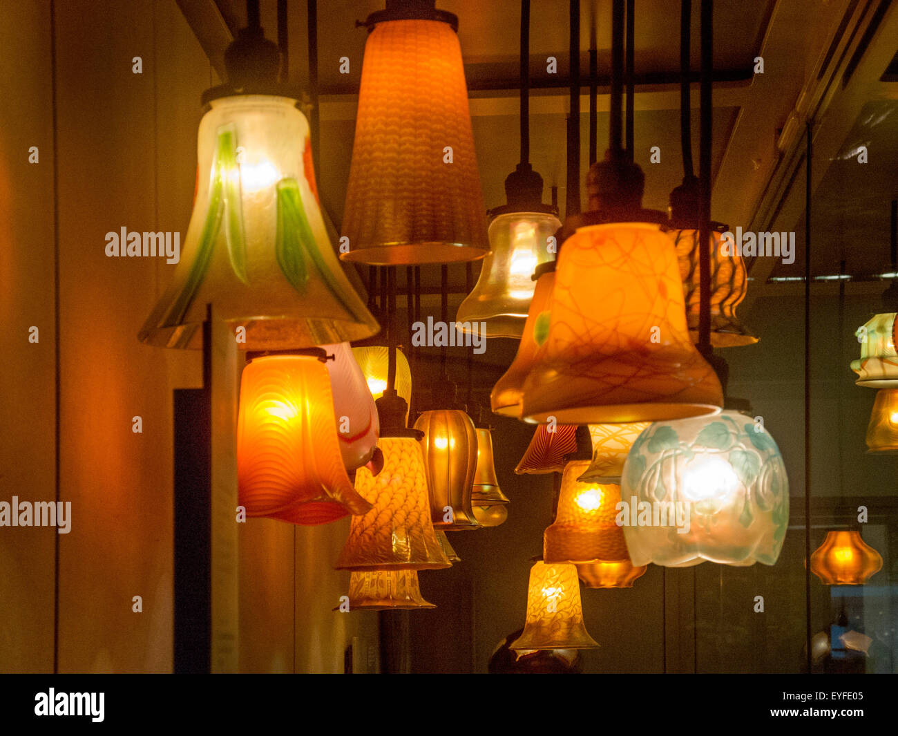 19th century Art Deco lampshades show a variety of patters, many with a flower motif. Stock Photo