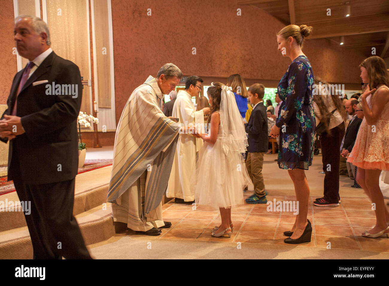 Girls boys wearing communion dresses hi-res stock photography and images -  Alamy