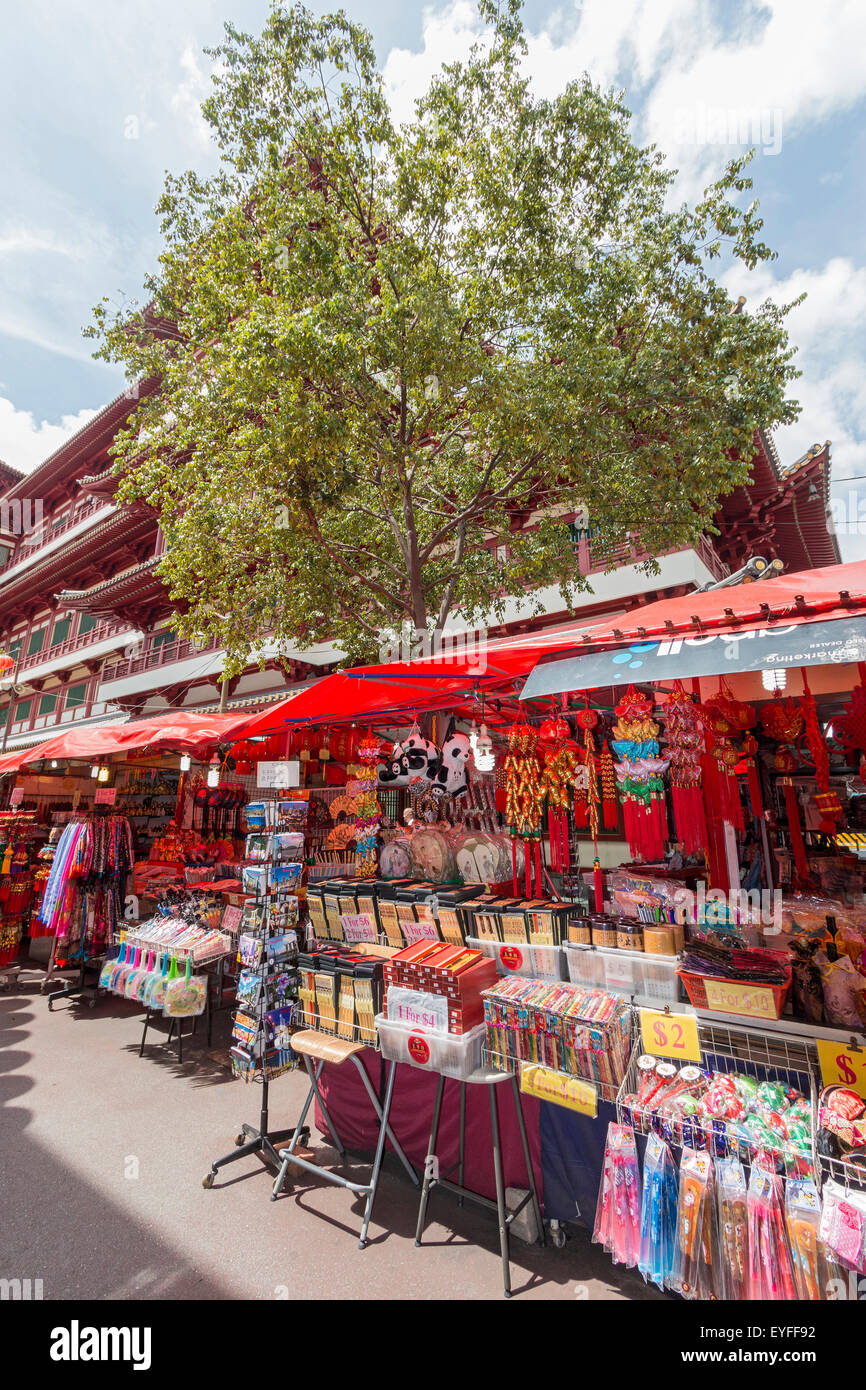 Outside stalls in Singapore's Chinatown district selling tourist souvenirs, purses, scarves and much more. Stock Photo