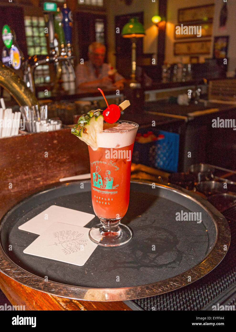 Real, original Singapore Sling drinks at the Long Bar of Raffles Hotel. Stock Photo