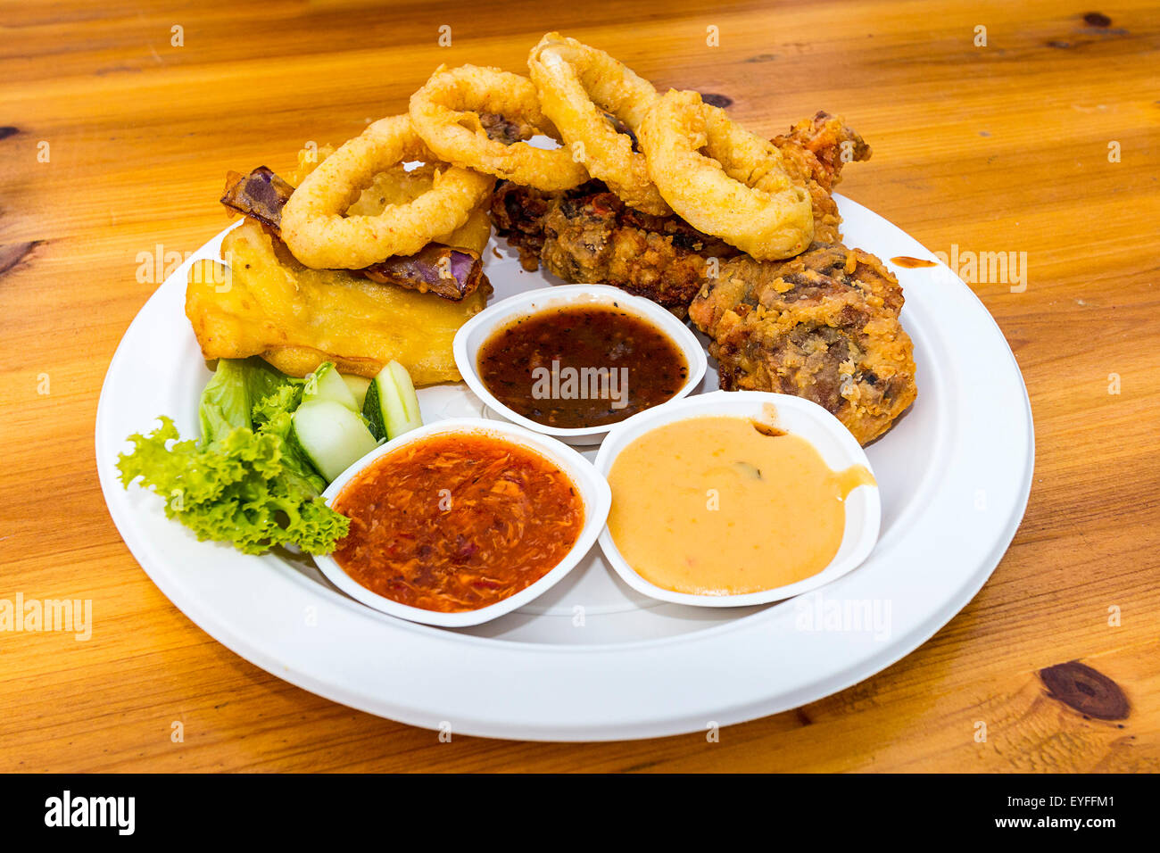 Singapore style soft shelled crab and calamari with onion rings and