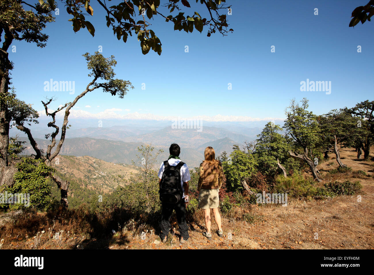 Tourists hiking on the Kumaon trek in Indian Himalayas; Utaranchal