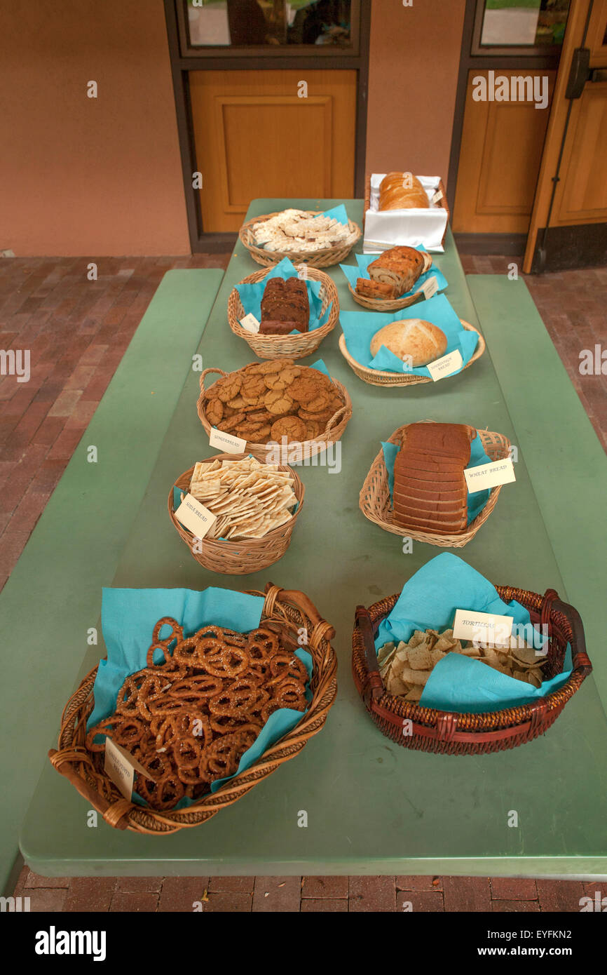 At a Laguna Niguel, CA, Catholic church a collection of breads in baskets symbolize the congregation's unity with all people and God in preparation for First Communion, also known as Holy Eucharist. Stock Photo