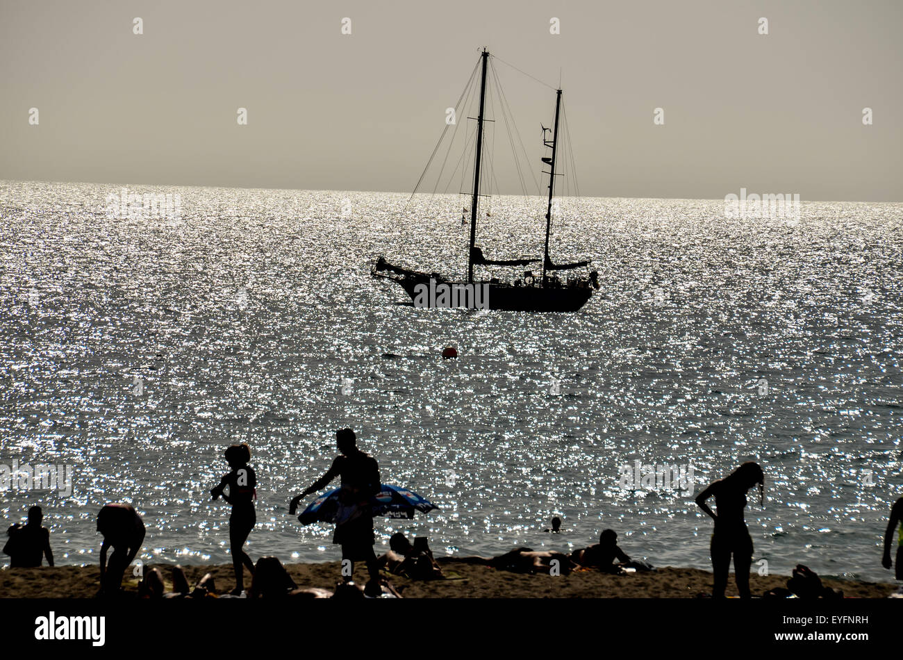 Silhouette Boat in the Ocean Stock Photo - Alamy