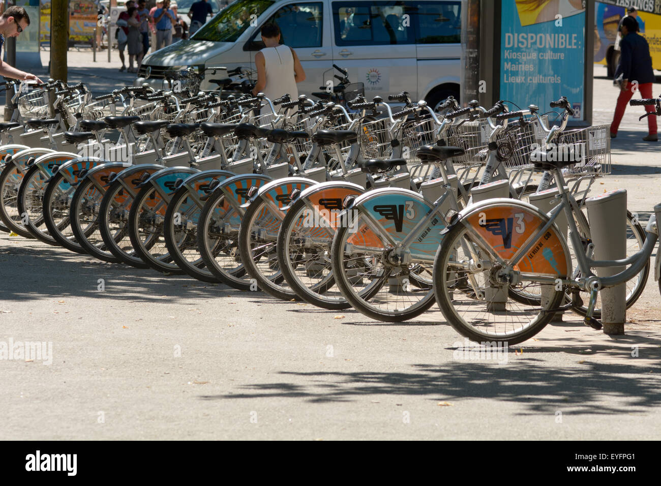 A row of VCub bicycles at a hire rack in Bordeaux city centre, France Stock Photo