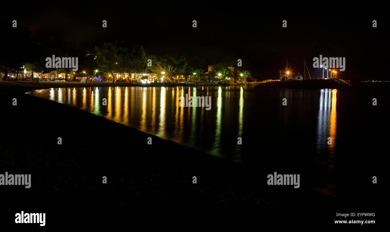 Night time view on marina Blato, Zivogosce, Croatia with various colors of lighting Stock Photo