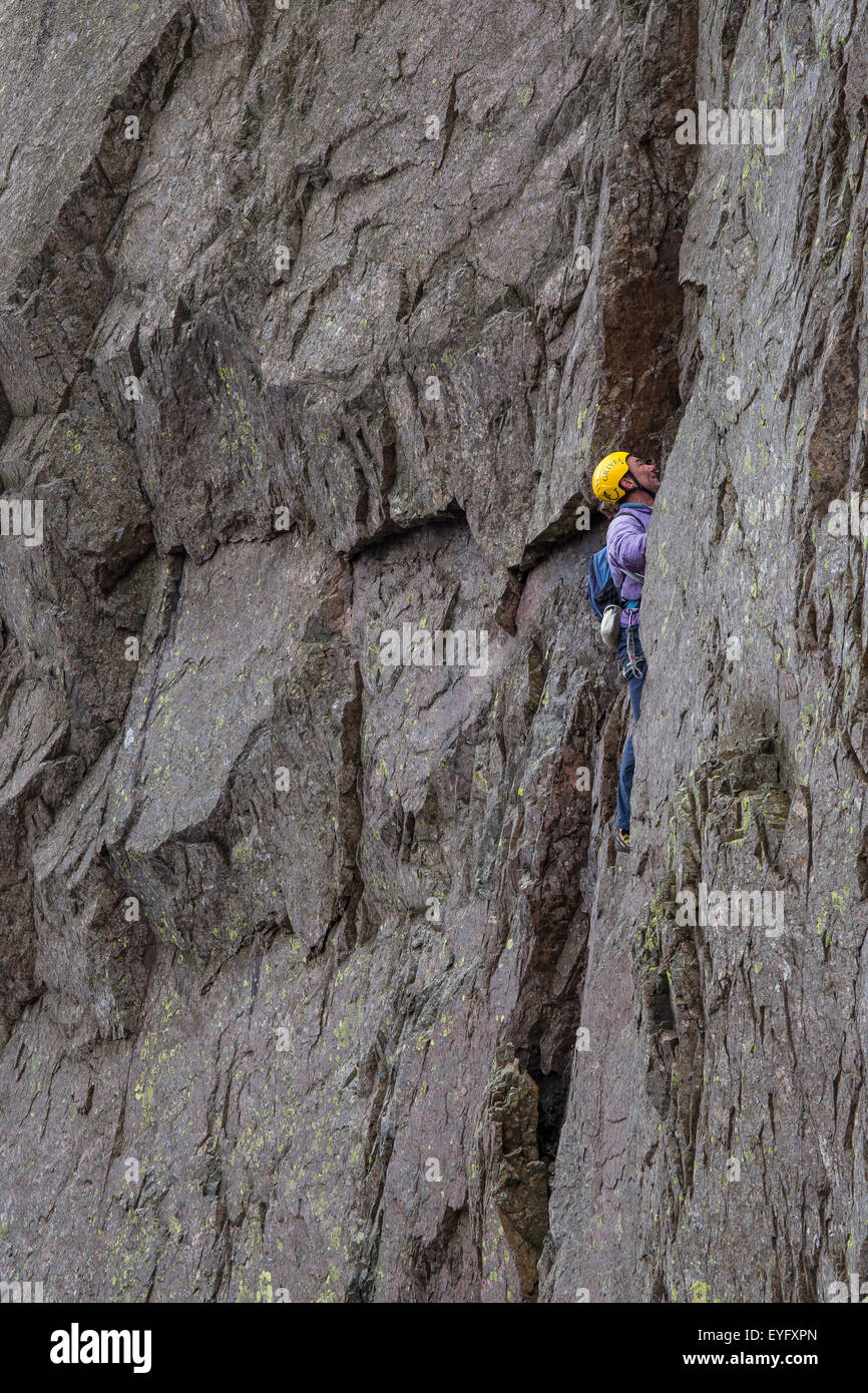 Rock climbers on Great Gable, in the Lake District UK climbing on the