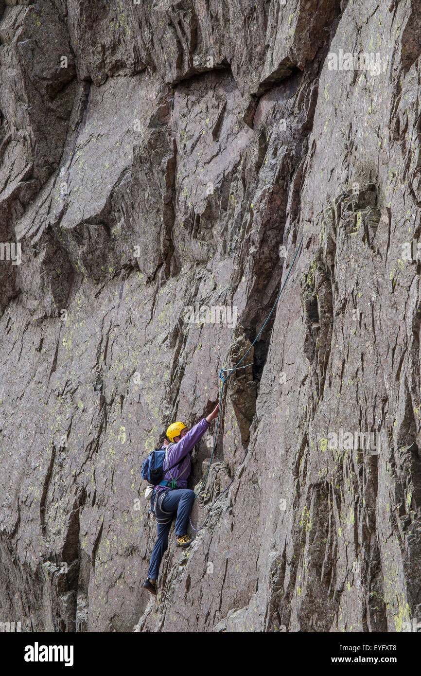 Rock climbers on Great Gable, in the Lake District UK climbing on the