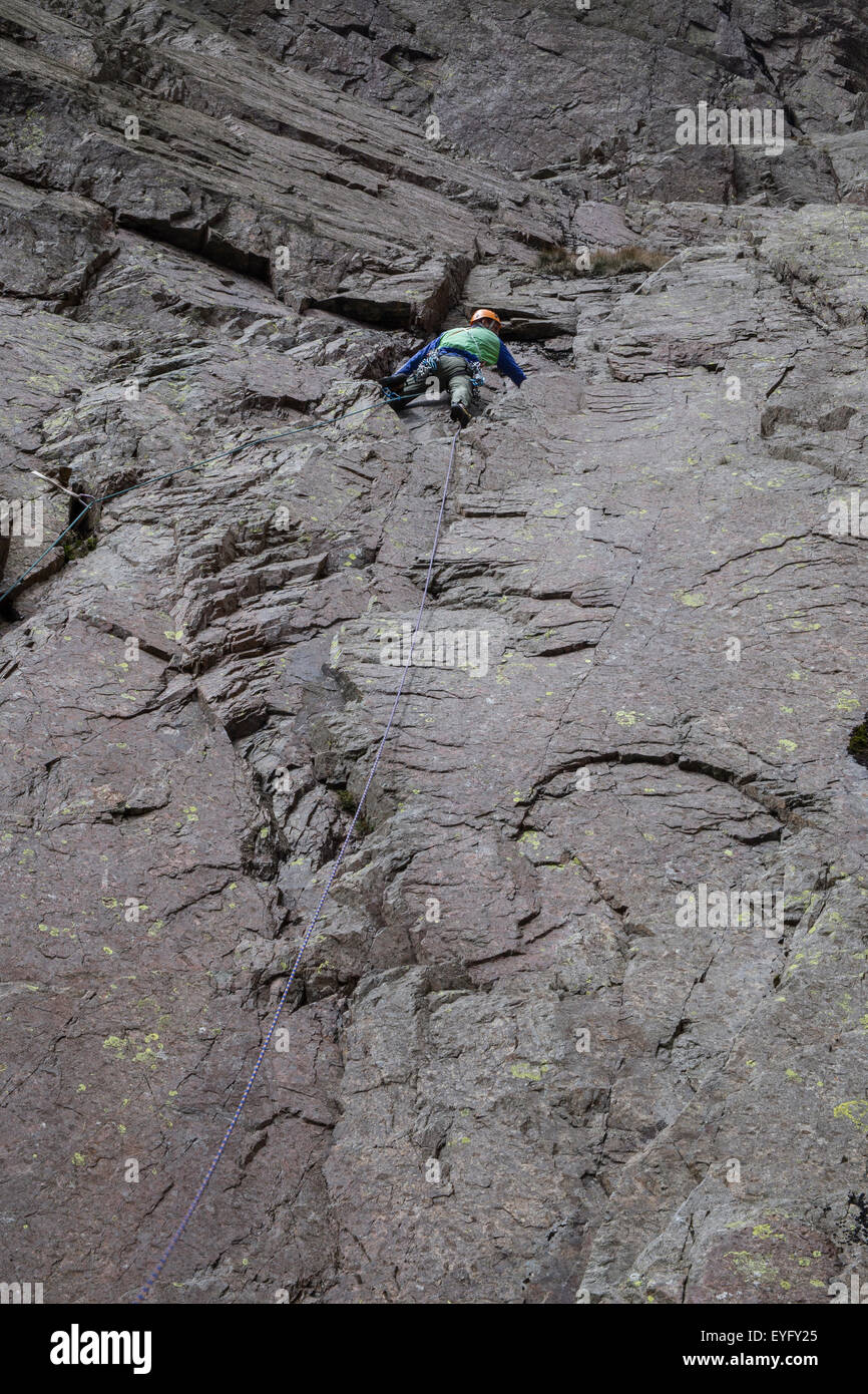 Rock climbers on Great Gable, in the Lake District UK climbing on the