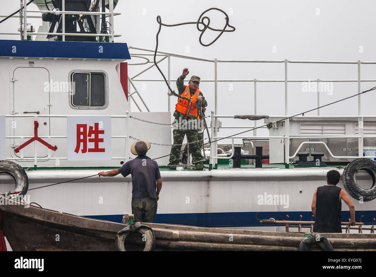 Dalian, China's Liaoning Province. 29th July, 2015. Coast guards carry out a marine rescue drill in Dalian, northeast China's Liaoning Province, July 29, 2015. © Gui Ziyun/Xinhua/Alamy Live News Stock Photo
