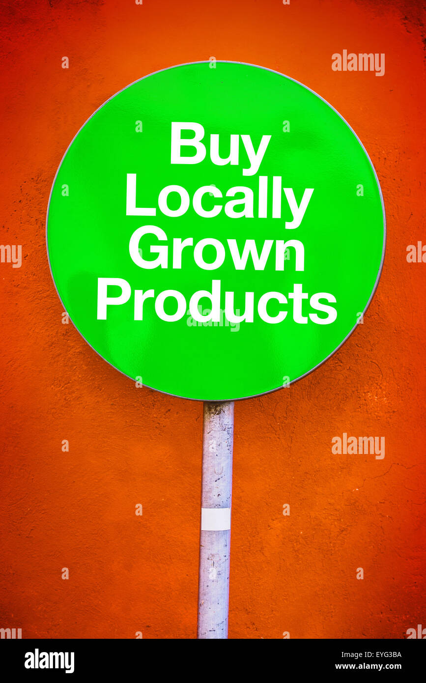 Buy Locally Grown Products Message on Green Sign Stock Photo