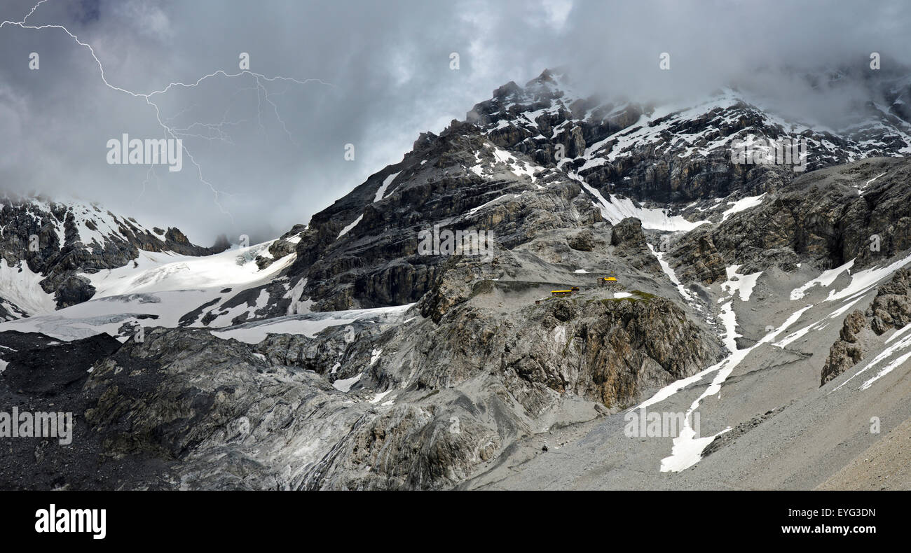 Italy Lombardy Stelvio National Park Central Alps ightning thunderstorm Quinto Alpini Hut Zebrù Glacier and Valley Stock Photo