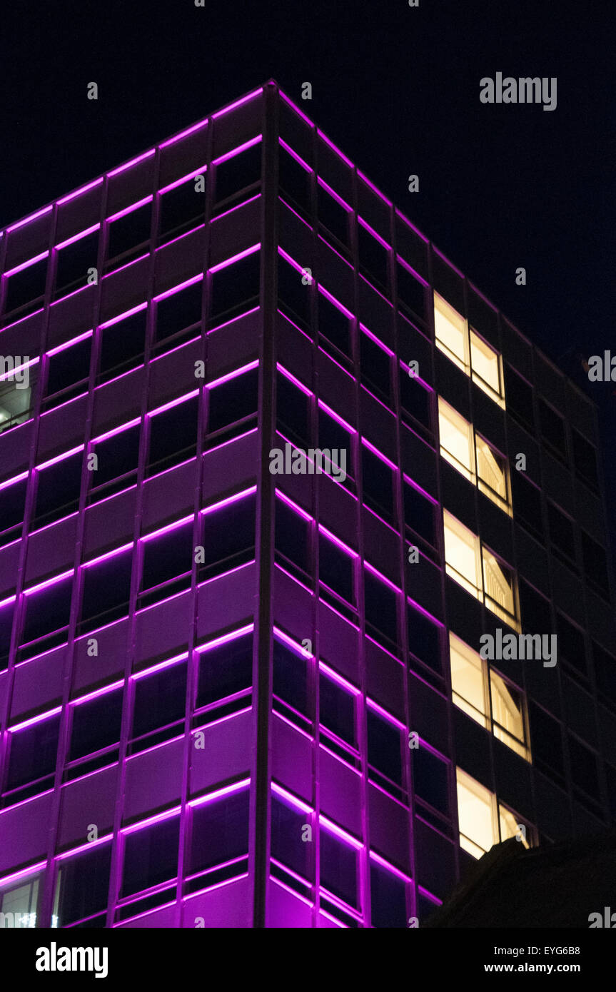 An office building in Nottingham City Centre lit up at night, Nottinghamshire England UK Stock Photo