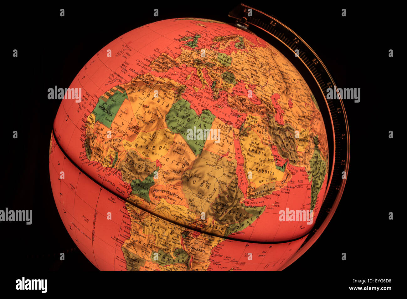 red light world globe illuminated from within with closeup on Europe and Africa Stock Photo