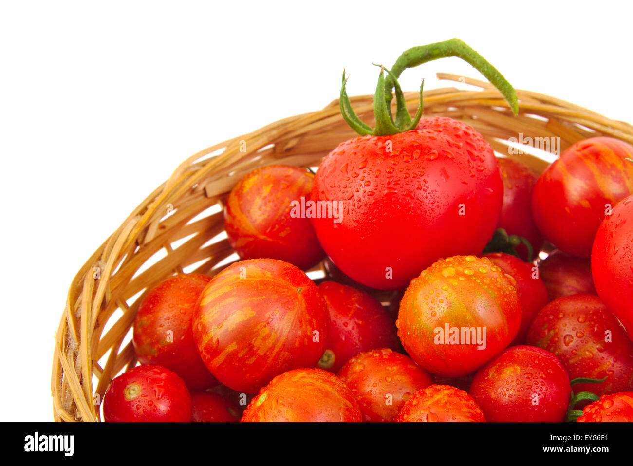 Fresh red tomatoes in basket isolated on white background Stock Photo ...