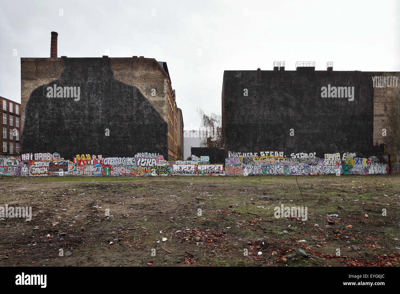 Berlin, Germany, painted over graffiti artist Blu and JR Stock Photo