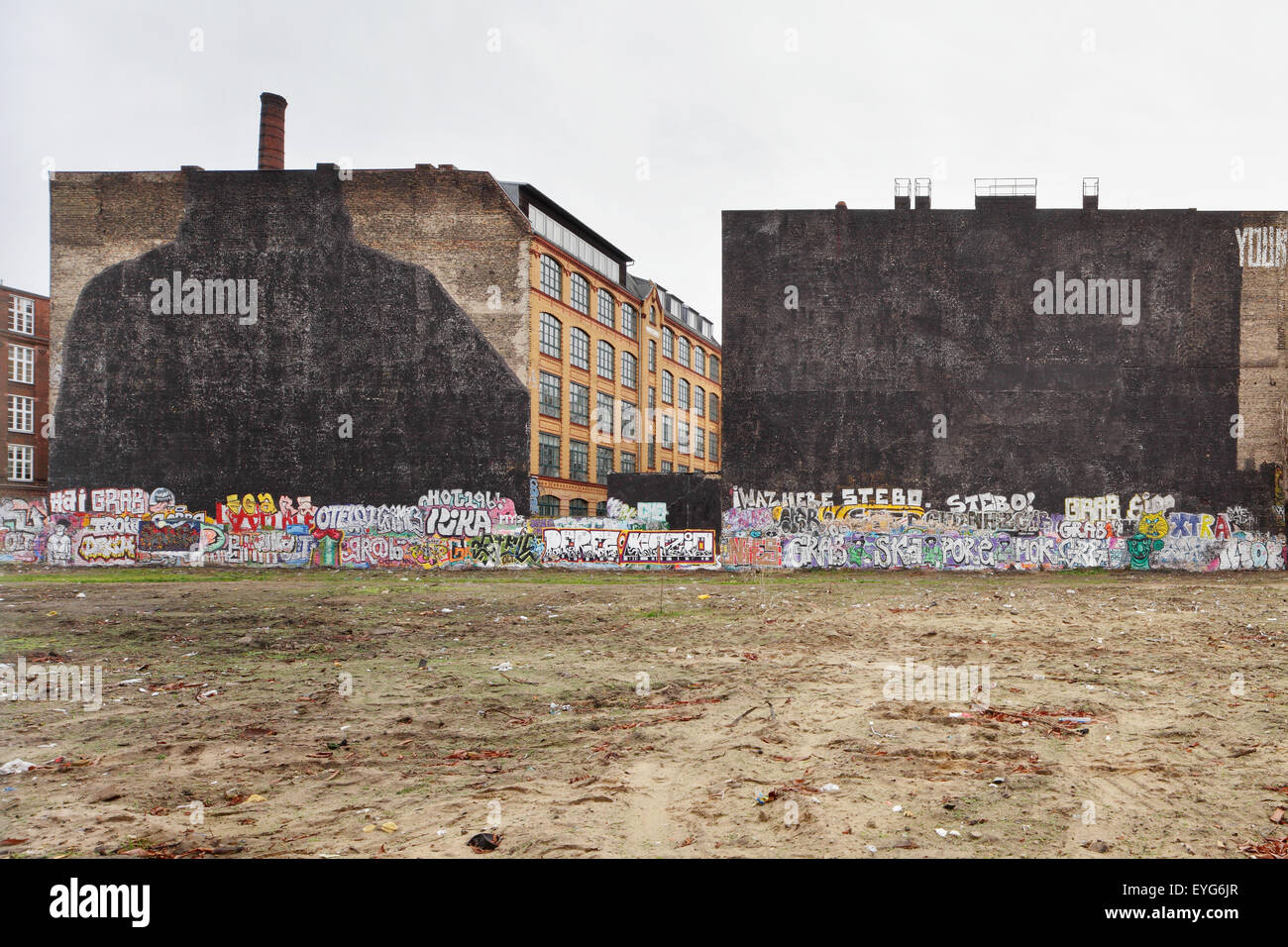 Berlin, Germany, painted over graffiti artist Blu and JR Stock Photo