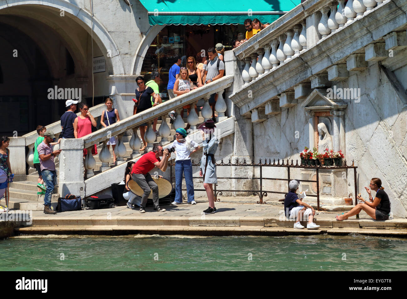 Professional fashion photo shooting in Venice, Ponte di Rialto Bridge Stock Photo