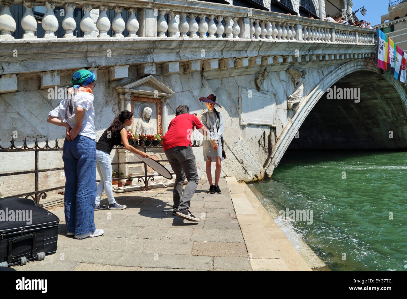 Professional fashion photo shooting in Venice, Ponte di Rialto Bridge Stock Photo