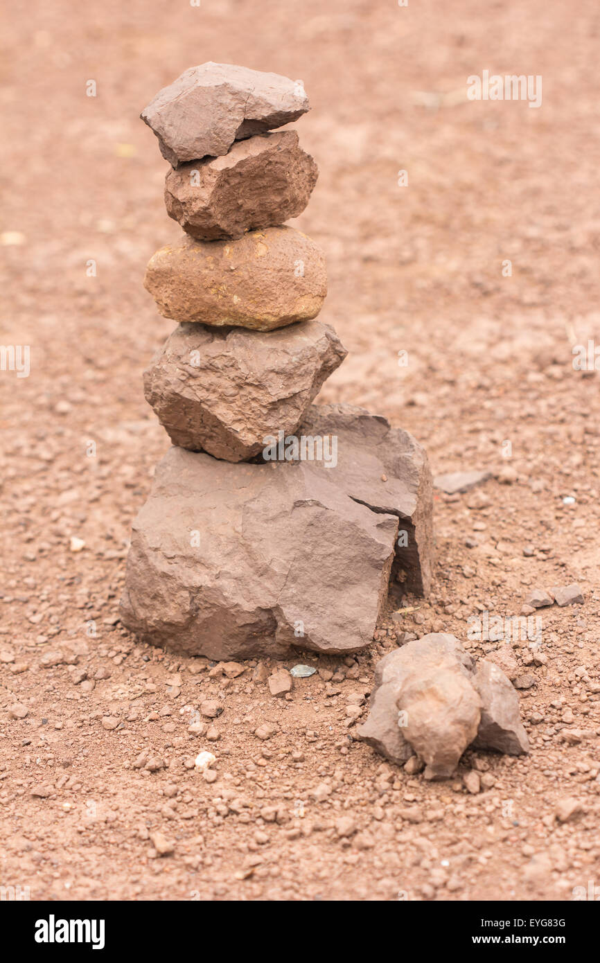 Sort stones to renew their faith. Stock Photo