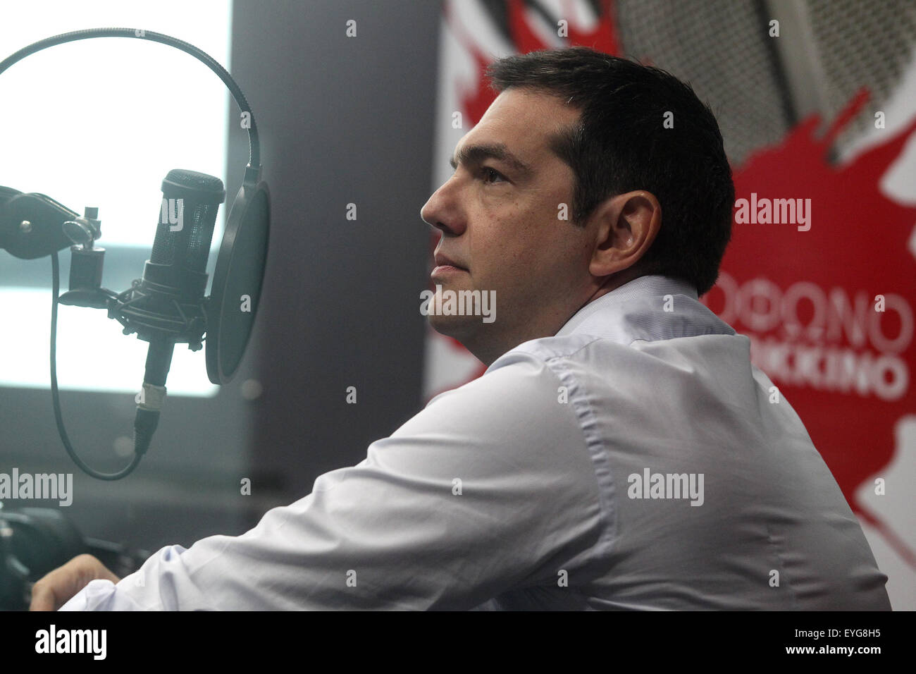 Athens, Greece. 29th July, 2015. Greek Prime Minister Alexis Tsipras receives an interview at a radio station, Athens, Greece, July 29, 2015. Tsipras has launched a communication campaign to clarify why Greek government accepted the new bailout terms. Credit:  Marios Lolos/Xinhua/Alamy Live News Stock Photo