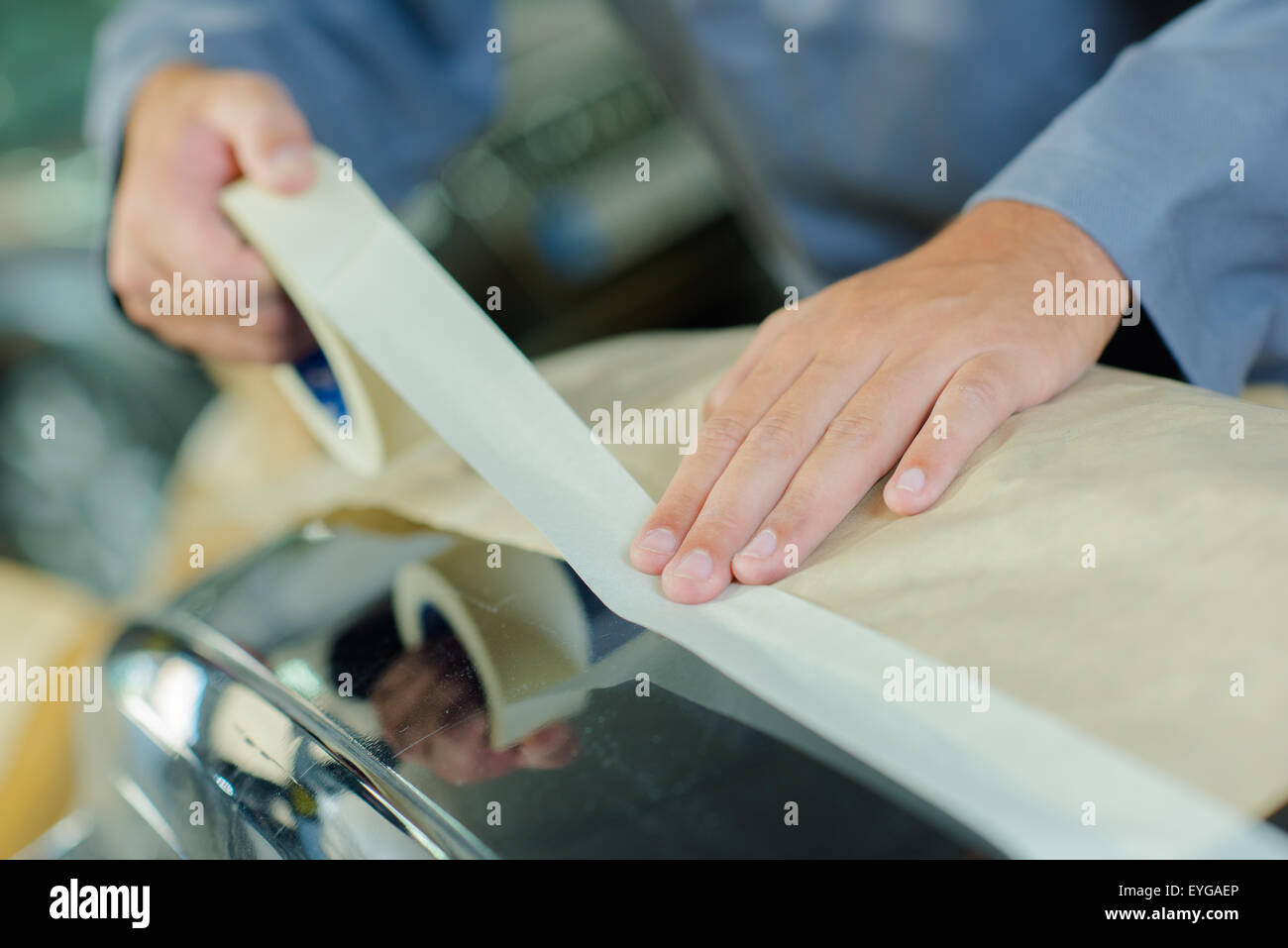 Mechanic masking car Stock Photo