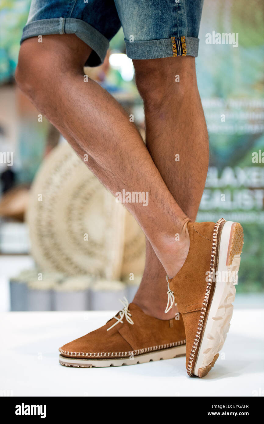 Model Danny wears shoes from the brand El Naturalista at a photo shoot at the GDS shoe show in Duesseldorf, Germany, 29 July 2015.  Presented at the show are at least 900 brands showing their collections for Spring/Summer 2016. Photo: MARIUS BECKER/dpa Stock Photo