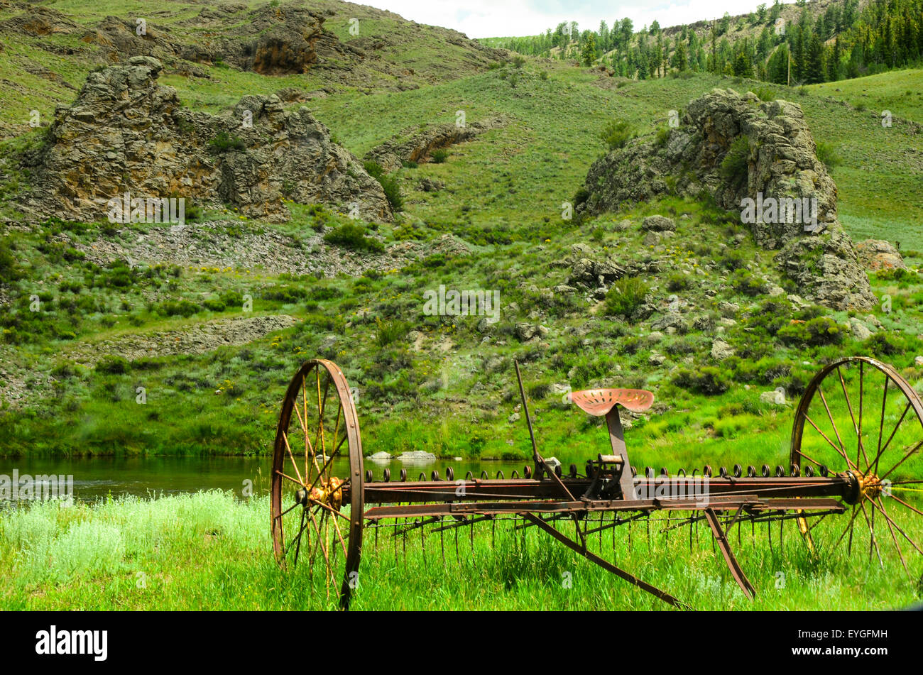 An old piece of farm equipment near Lake City, CO Stock Photo