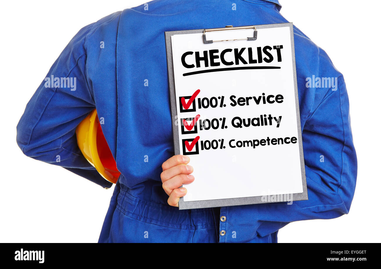 Worker with checklist for quality and service on a clipboard Stock