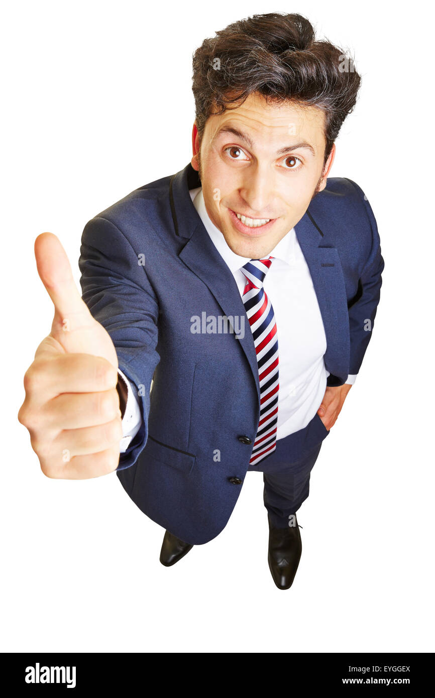 Smiling business man holding thumb up for motivation Stock Photo