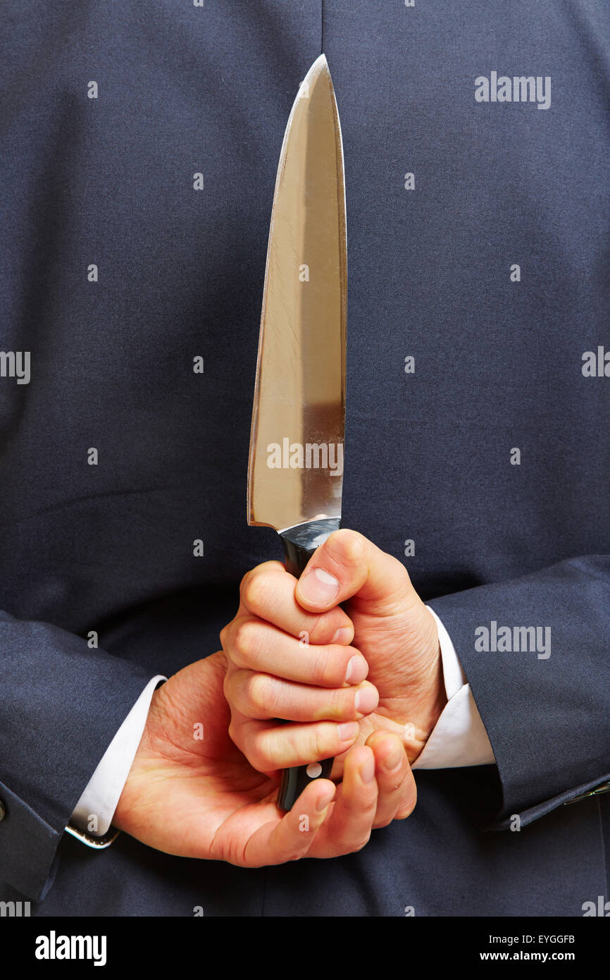 Man knife behind back hires stock photography and images Alamy