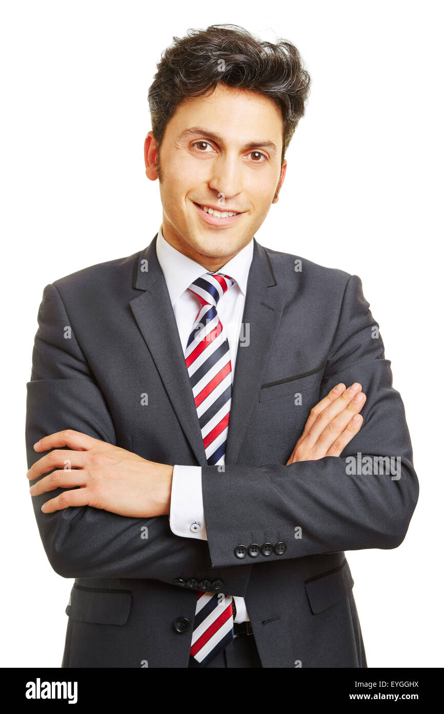 Smiling happy businessman with his arms crossed Stock Photo - Alamy