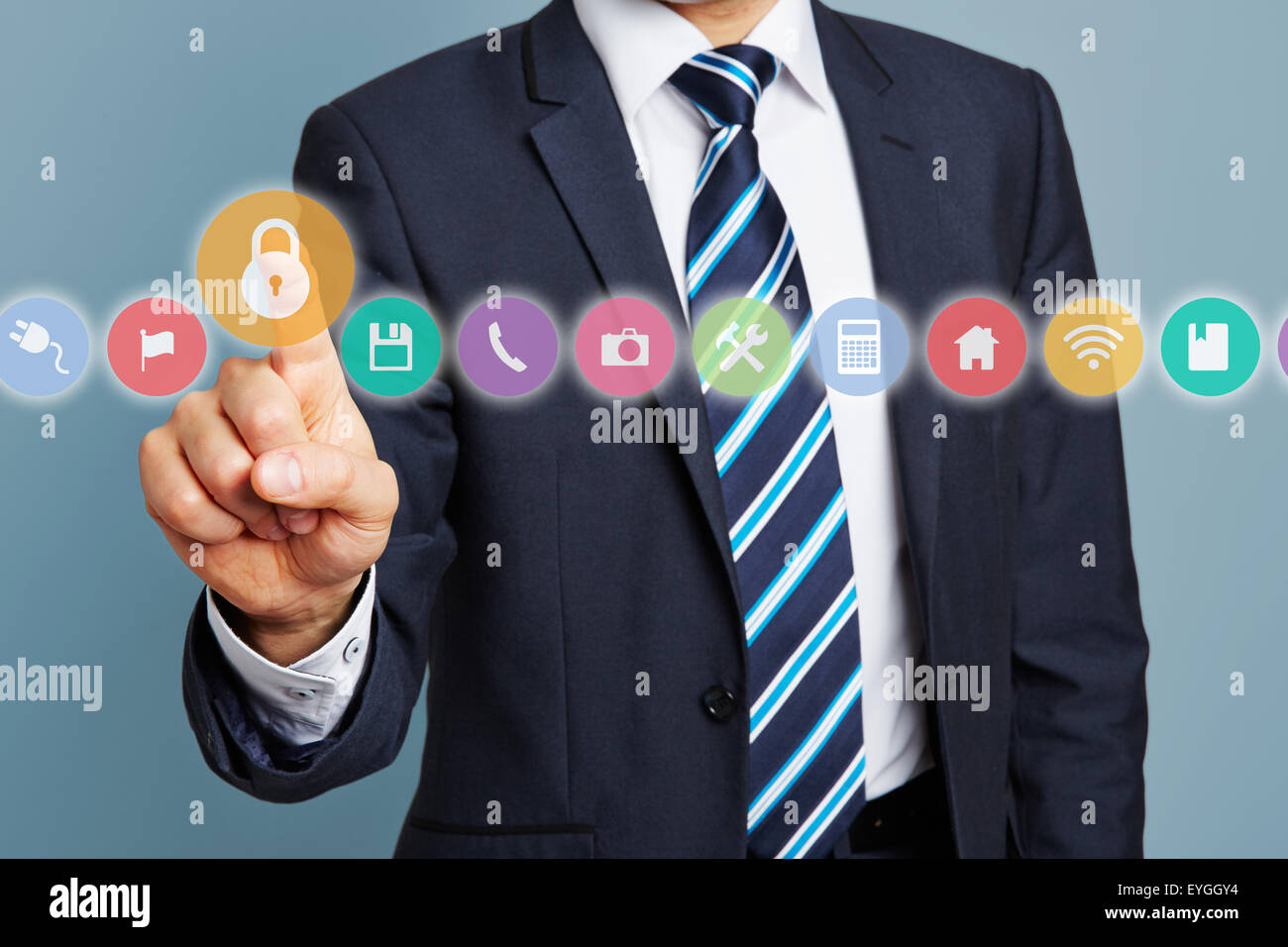 Hand of manager pressing lock icon on a touchscreen Stock Photo - Alamy