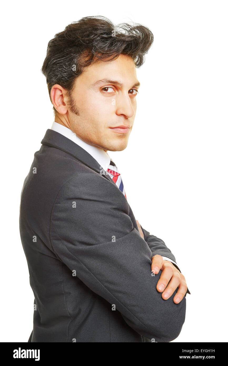 Serious looking business man with his arms crossed Stock Photo - Alamy