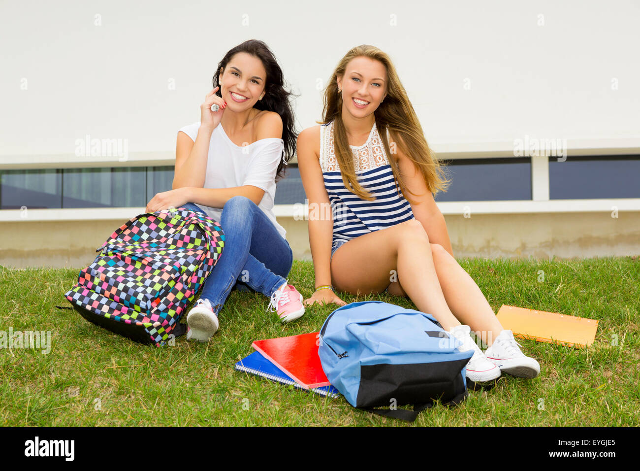 Beautiful and happy teenage students in the school Stock Photo - Alamy