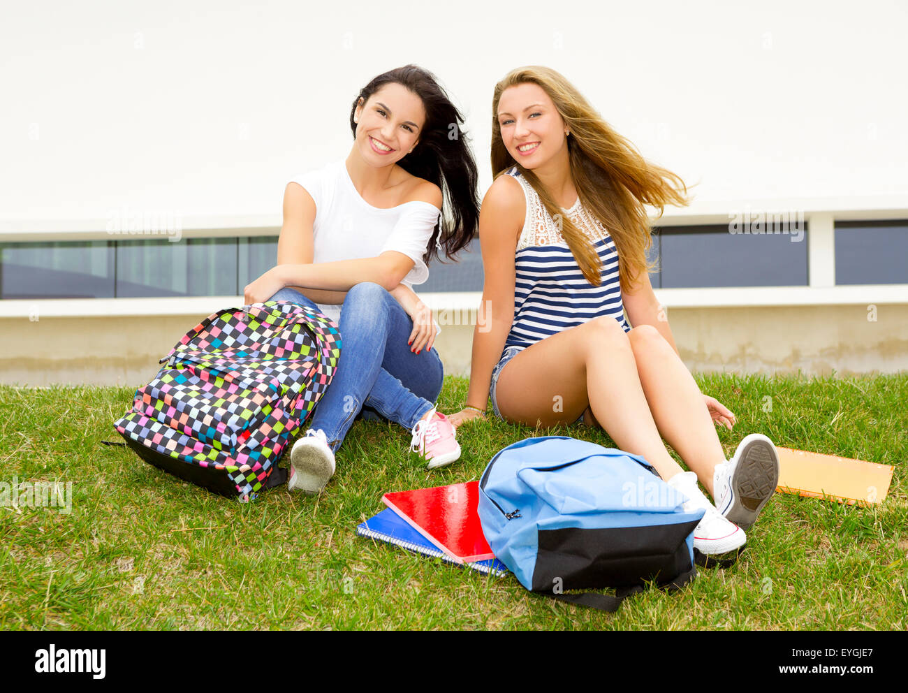 Beautiful and happy teenage students in the school Stock Photo - Alamy