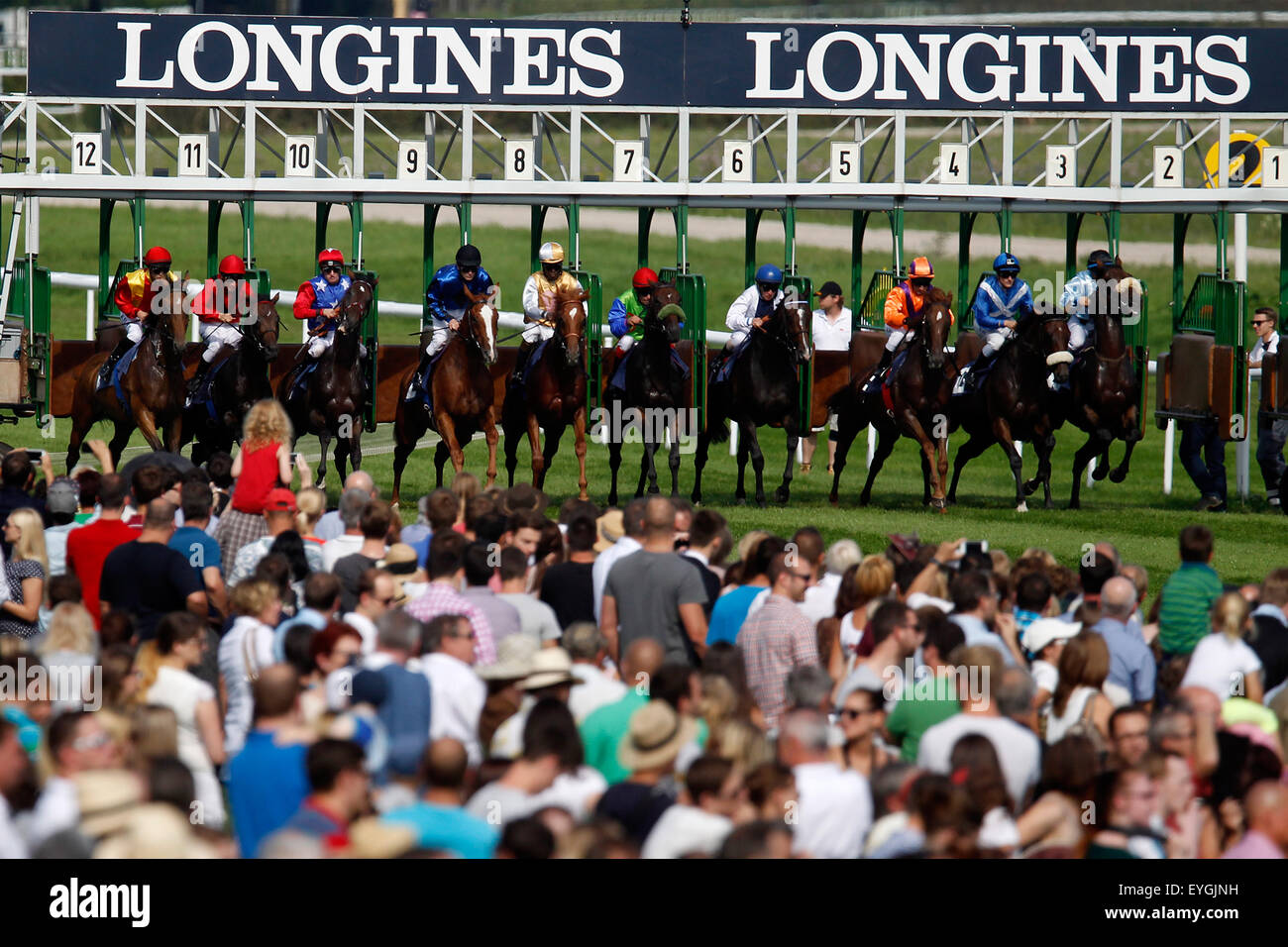 Iffezheim, Germany, horses and jockeys at the start of a horse race Stock Photo