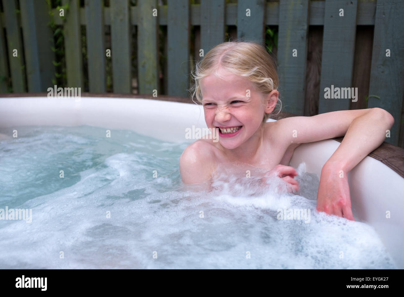 Blonde Girl Taking A Hot Bath