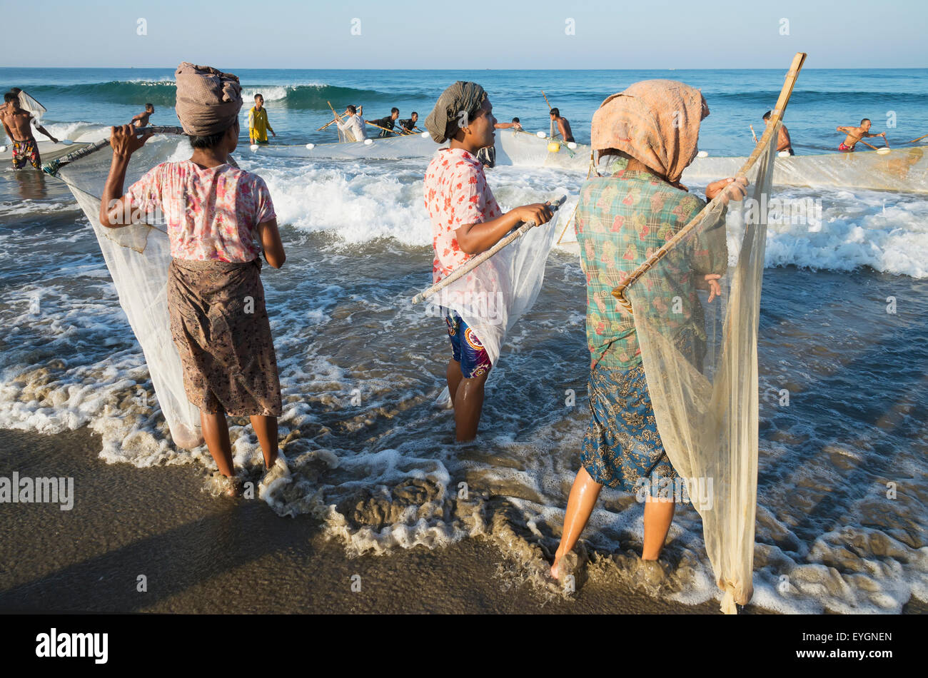Men pulling large fishing net hi-res stock photography and images