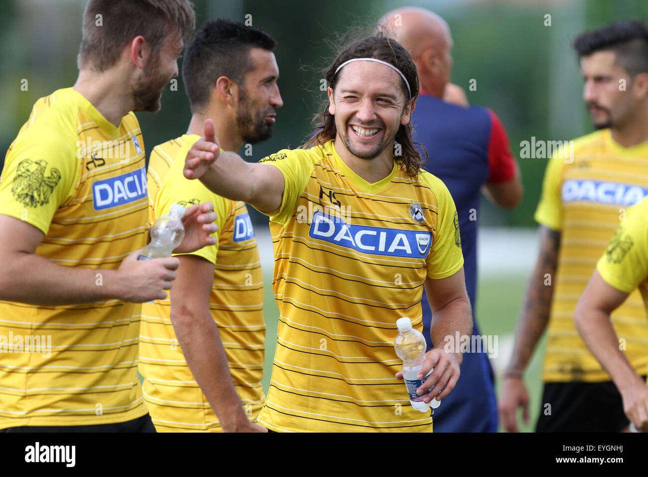 Udine, Italy. 29th July, 2015. Udinese's midfielder Manuel Iturrasmiles with Udinese's defender Neuton Sergio Piccoli during the friendly pre-season football match Udinese Calcio v Clodiense on 29th July, 2015 at Bruseschi training center in Udine, Italy. Credit:  Andrea Spinelli/Alamy Live News Stock Photo