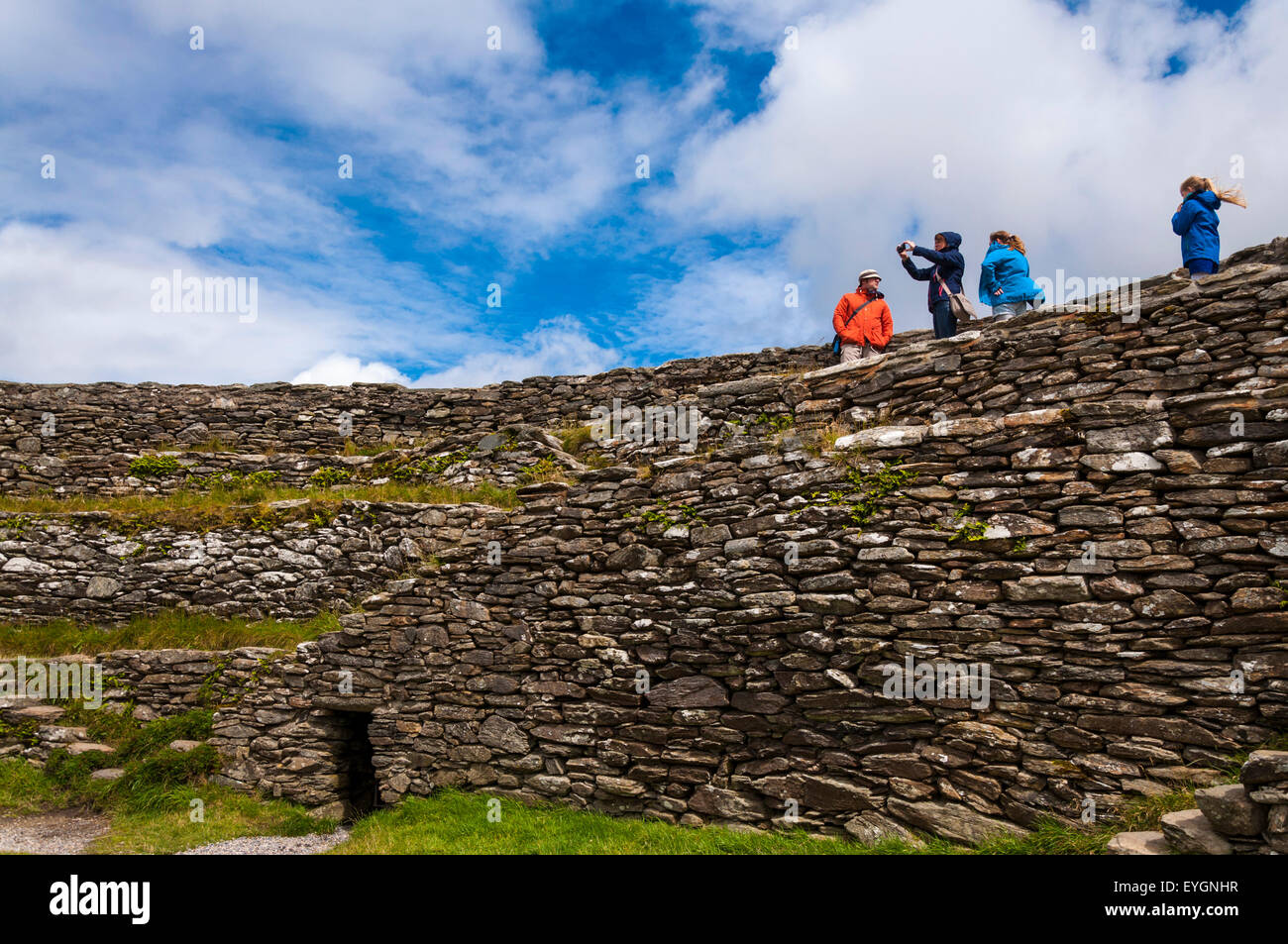 Burnfoot, County Donegal, Ireland. 29th July, 2015. Ireland weather: Visitors at the 2000 year-old Grianan Ailligh a stone-walled hilltop fort on a blustery day of sunshine and showers. Credit:  Richard Wayman/Alamy Live News Stock Photo