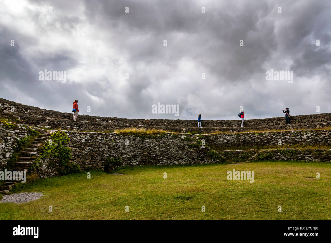 Burnfoot, County Donegal, Ireland. 29th July, 2015. Ireland weather: Visitors at the 2000 year-old Grianan Ailligh a stone-walled hilltop fort on a blustery day of sunshine and showers. Credit:  Richard Wayman/Alamy Live News Stock Photo
