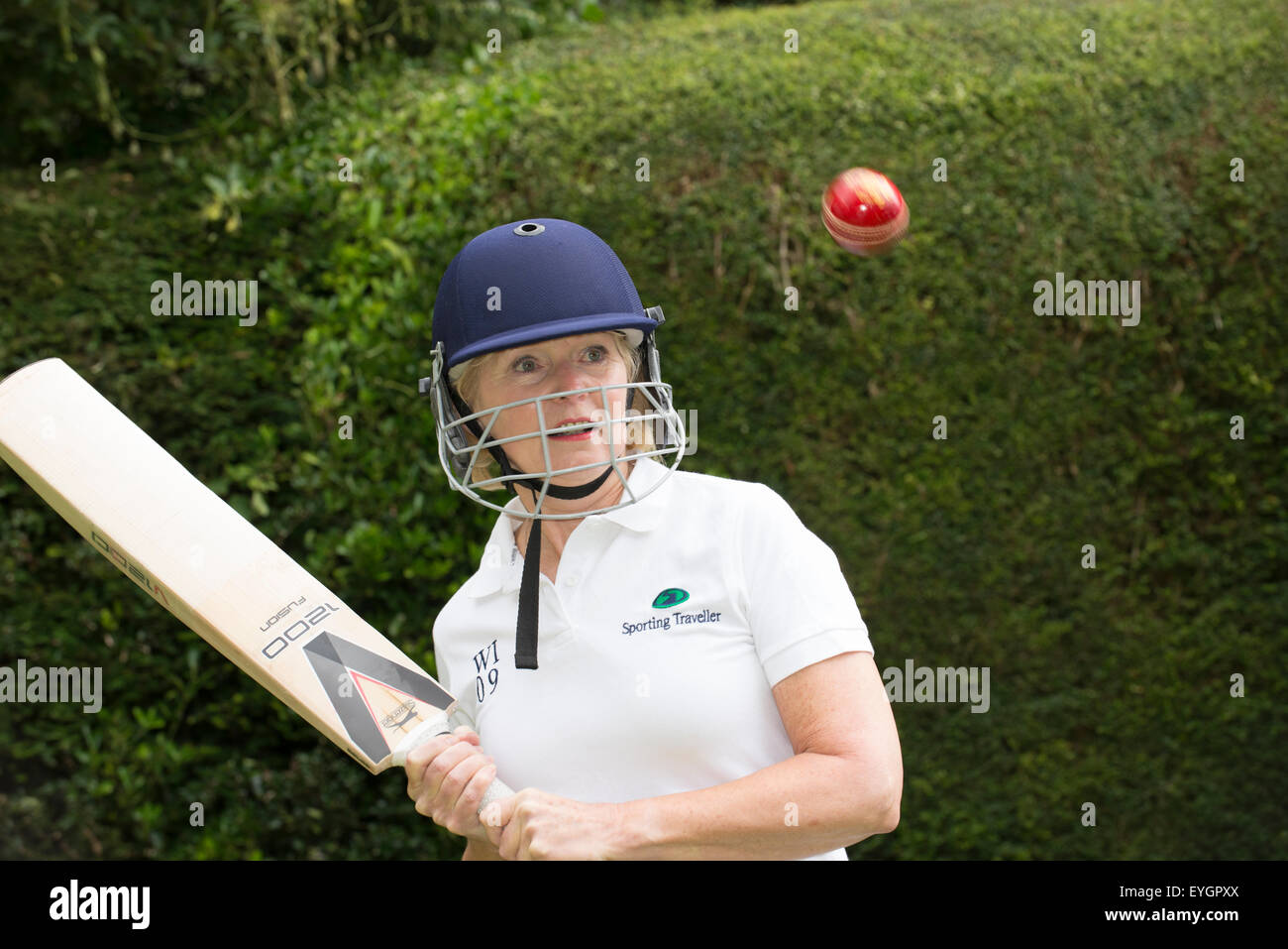 Elderly Woman Cricketer Wearing Safety Helmet Playing Cricket Stock Elderly Woman Cricketer Wearing Safety Helmet Playing Cricket Stock
